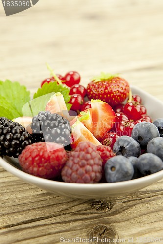 Image of fresh tasty berry collection on table in summer