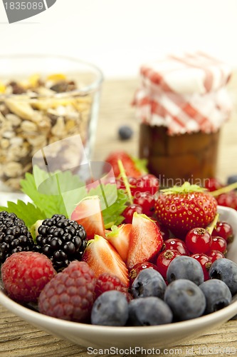 Image of fresh tasty berry collection on table in summer