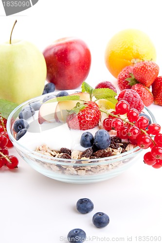 Image of deliscious healthy breakfast with flakes and fruits isolated