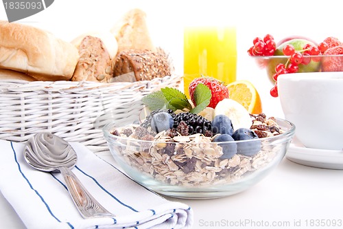 Image of deliscious healthy breakfast with flakes and fruits isolated