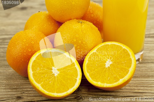 Image of fresh and  healthy tasty orange juice on table