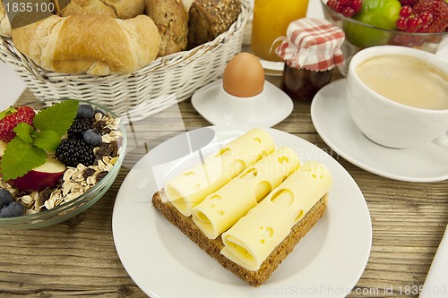 Image of breakfast in morning with fruits and cheese toast and coffee