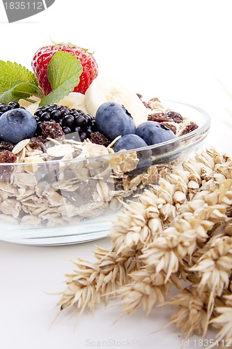 Image of deliscious healthy breakfast with flakes and fruits isolated