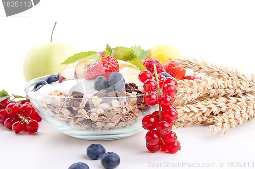 Image of deliscious healthy breakfast with flakes and fruits isolated