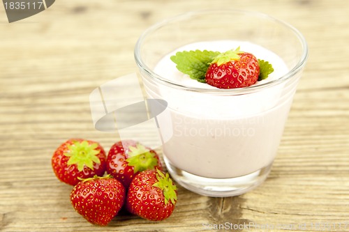 Image of fresh tasty strawberry yoghurt shake dessert on table