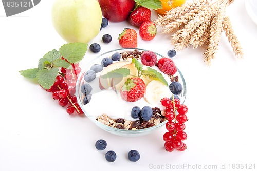 Image of deliscious healthy breakfast with flakes and fruits isolated