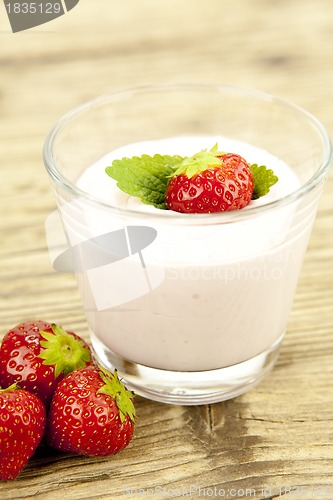 Image of fresh tasty strawberry yoghurt shake dessert on table