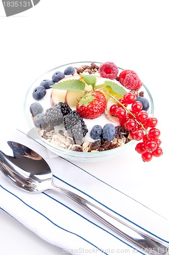 Image of deliscious healthy breakfast with flakes and fruits isolated