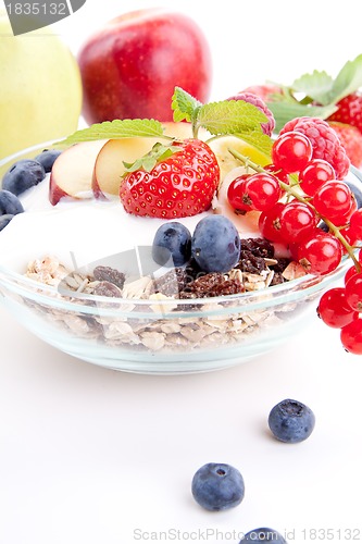 Image of deliscious healthy breakfast with flakes and fruits isolated