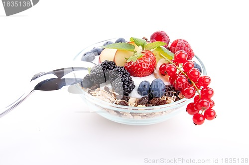 Image of deliscious healthy breakfast with flakes and fruits isolated