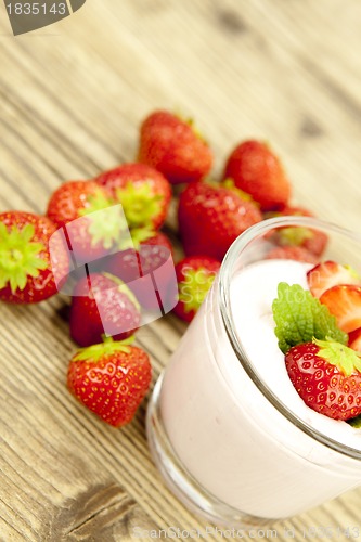 Image of fresh tasty strawberry yoghurt shake dessert on table