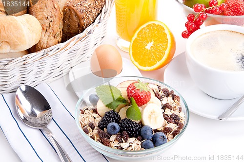 Image of deliscious healthy breakfast with flakes and fruits isolated