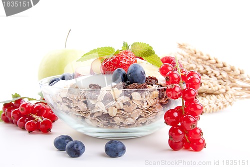 Image of deliscious healthy breakfast with flakes and fruits isolated