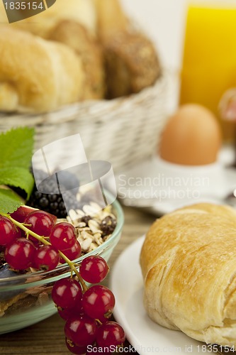 Image of traditional french breakfast on table in morning