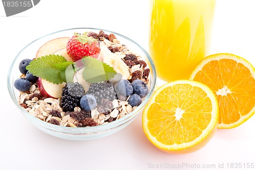 Image of deliscious healthy breakfast with flakes and fruits isolated