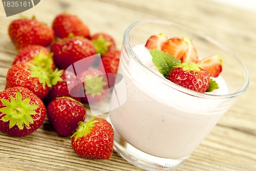 Image of fresh tasty strawberry yoghurt shake dessert on table