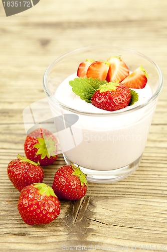 Image of fresh tasty strawberry yoghurt shake dessert on table