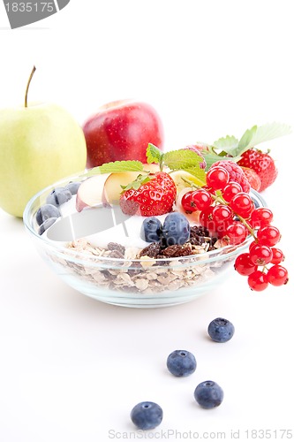 Image of deliscious healthy breakfast with flakes and fruits isolated