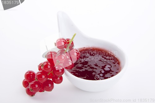 Image of tasty fresh red currant jam isolated on white