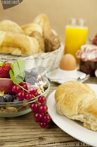 Image of traditional french breakfast on table in morning