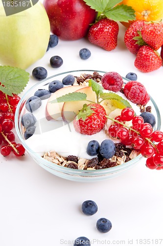 Image of deliscious healthy breakfast with flakes and fruits isolated