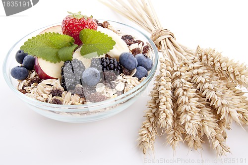 Image of deliscious healthy breakfast with flakes and fruits isolated