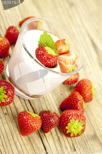 Image of fresh tasty strawberry yoghurt shake dessert on table