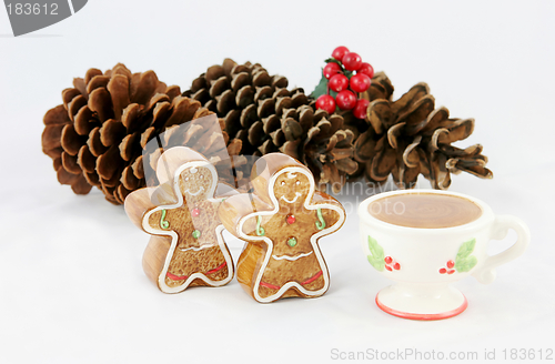 Image of Gingerbread men and pinecones for xmas