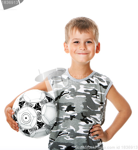 Image of Boy holding soccer ball