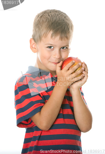 Image of Boy holding an apple