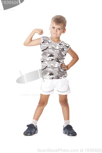Image of Boy showing his muscle