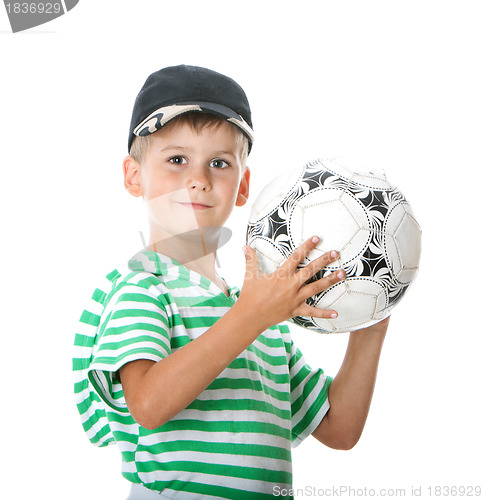 Image of Boy holding soccer ball