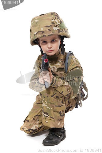 Image of Young soldier with rifle