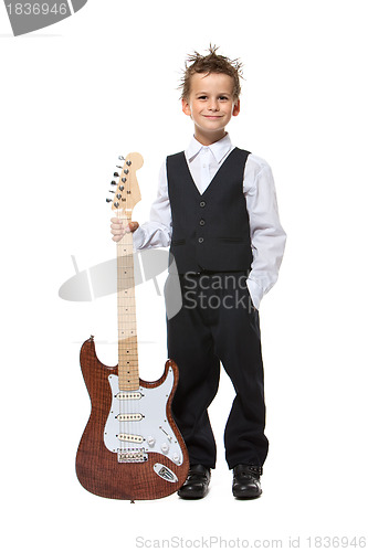 Image of Boy holding a guitar