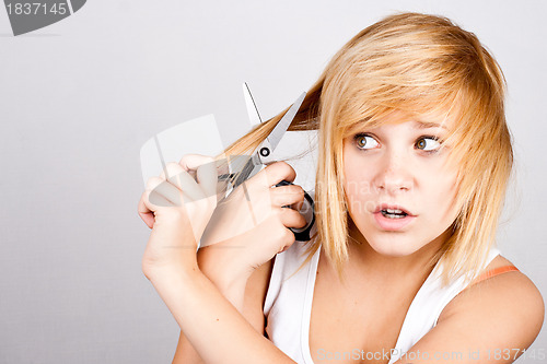 Image of woman with scissors