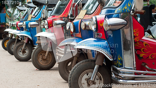 Image of Tuk-tuk taxis in Thailand