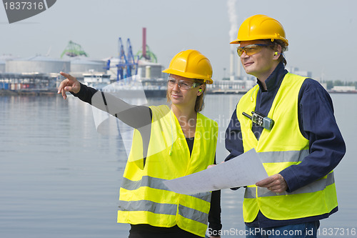 Image of Construction workers in harbor