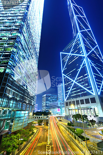 Image of city in night with busy traffic