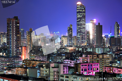 Image of apartment building at night