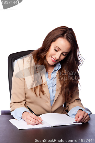Image of Corporate business woman writing