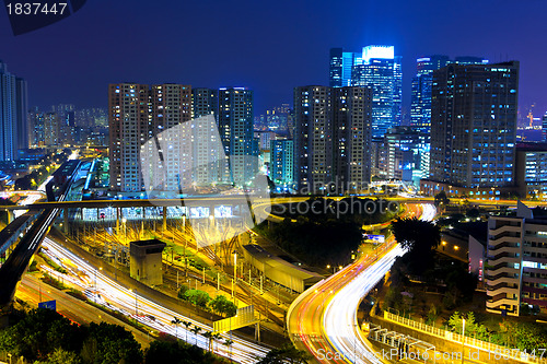 Image of highway and traffic in city at night