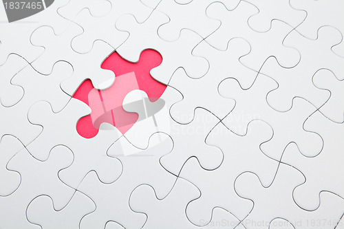 Image of puzzle with missing piece