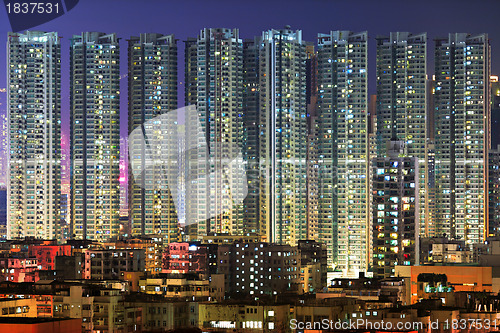 Image of apartment building at night