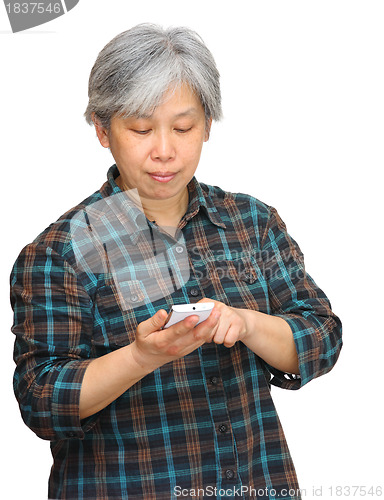 Image of middleage woman looking on phone