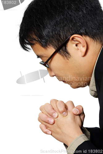 Image of Praying businessman