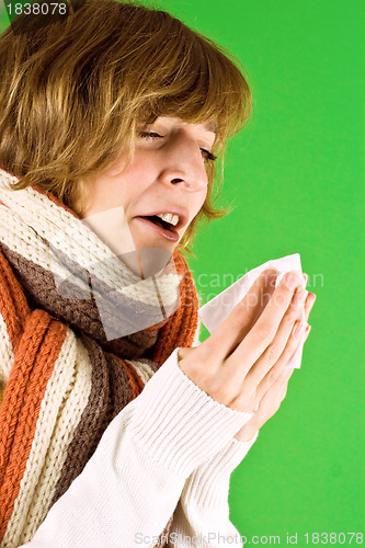 Image of cold girl sneezes 