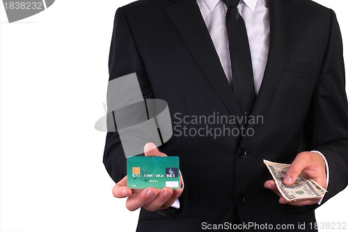 Image of Businessman with credit card and money