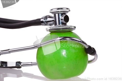 Image of Stethoscope and apple