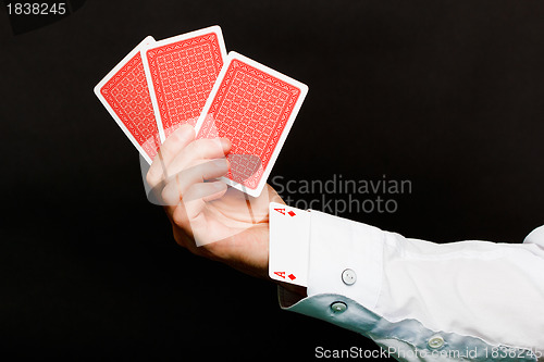 Image of playing cards and an ace in the hole