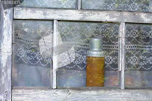 Image of Vintage Vacuum Flask in the Window